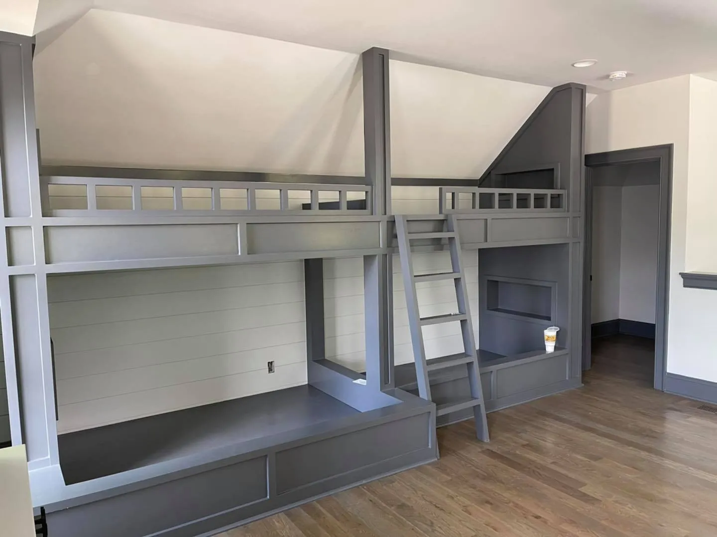 Built-in bunk beds with a ladder