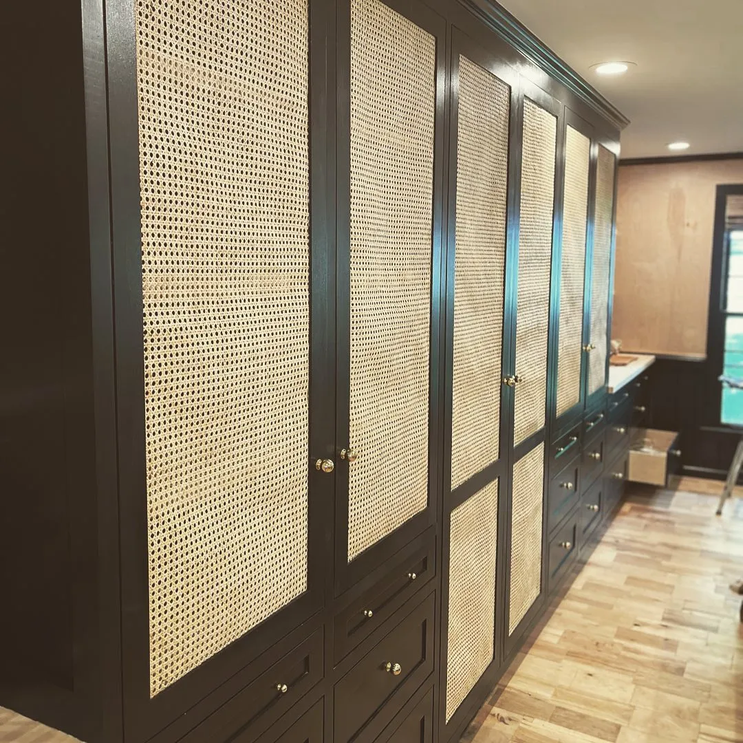 Built-in wardrobe with cane-front doors