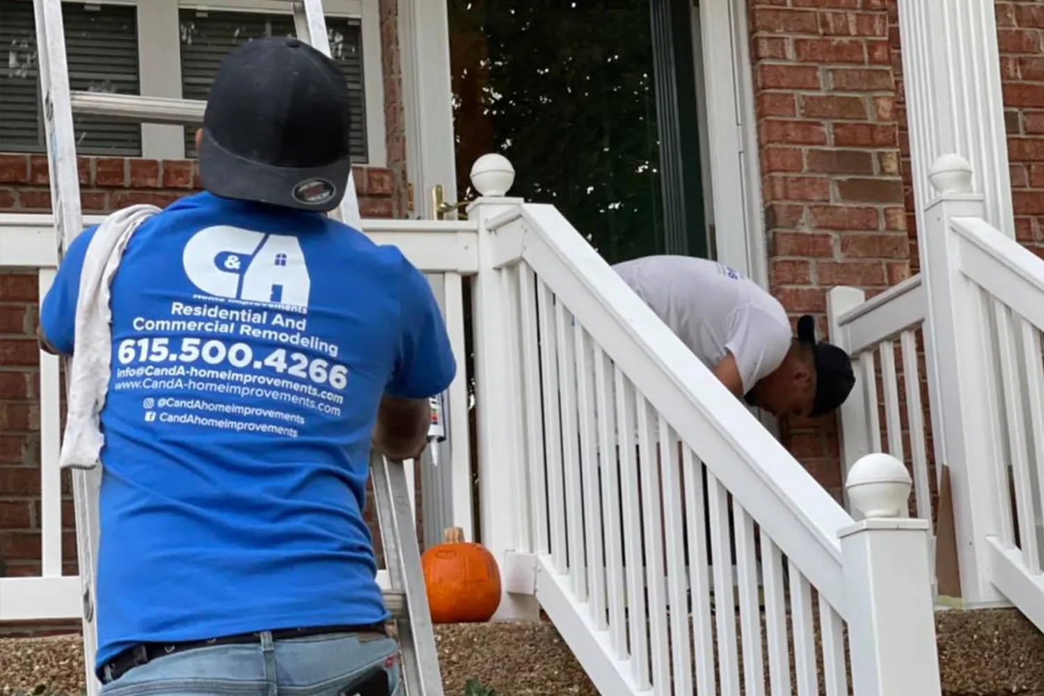 C&A crew installing a porch railing