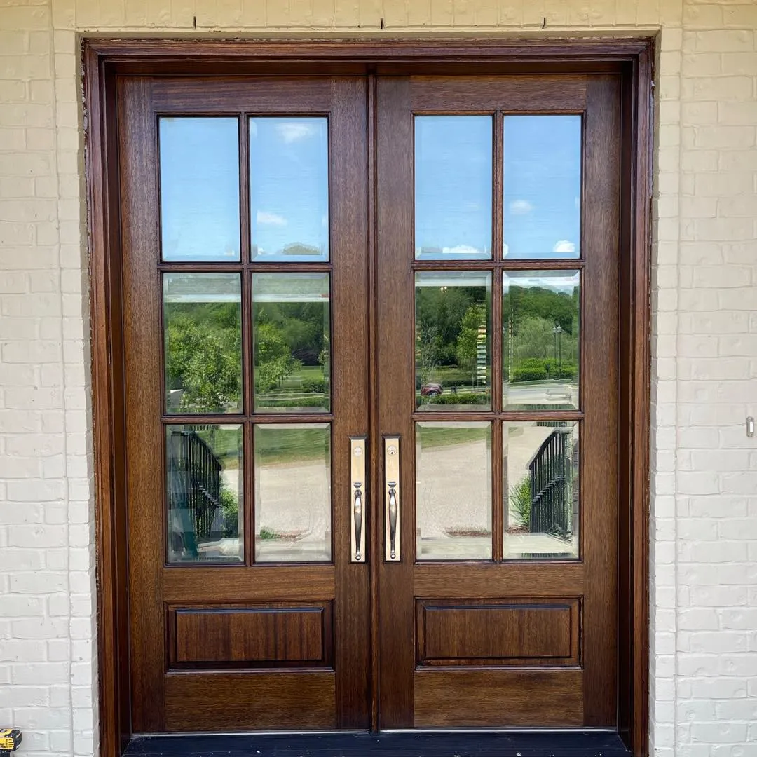 Double wood entry doors installed
